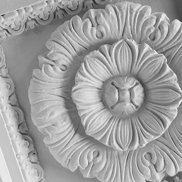 Grayscale Photo of Plaster Rose