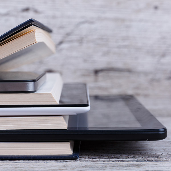 Stacked books and iPads